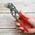 KNIPEX 86 01 180 Szczypce-klucz szczypce i klucz w jednym narzędziu Z antypoślizgowego tworzywa sztucznego fosforanowana, szara