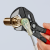 KNIPEX 86 01 180 Szczypce-klucz szczypce i klucz w jednym narzędziu Z antypoślizgowego tworzywa sztucznego fosforanowana, szara